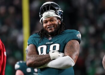 Philadelphia Eagles defensive tackle Jalen Carter (98) looks on between plays during the second half of an NFL wild card playoff football game against the San Francisco 49ers on Sunday, January 11, 2026, in Philadelphia.