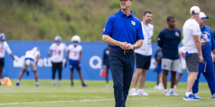 New York Giants coach Brian Daboll observing practice at camp.