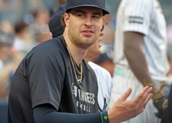 New York Yankees pitcher Cam Schlittler (31) in the dugout during the first inning.
