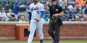 Jorge Polanco walks back to the dugout after striking out looking with the bases loaded in the seventh inning of the Mets' 3-2 win over Braves on July 29, 2026 in the first game of a split doubleheader at Citi Field.