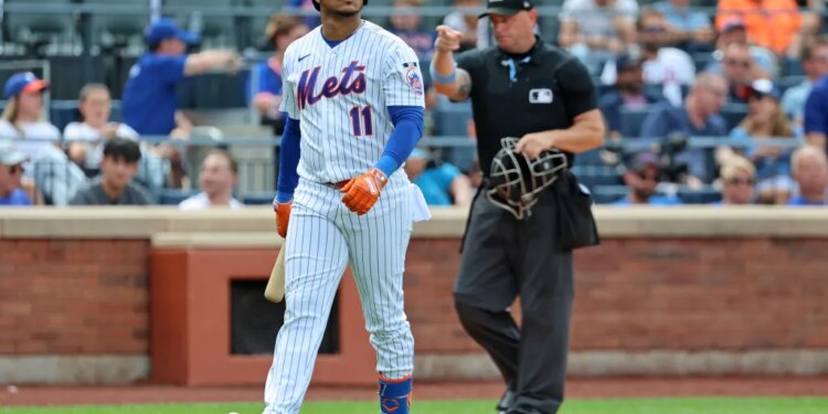 Jorge Polanco walks back to the dugout after striking out looking with the bases loaded in the seventh inning of the Mets' 3-2 win over Braves on July 29, 2026 in the first game of a split doubleheader at Citi Field.