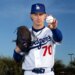 Los Angeles Dodgers pitcher Justin Wrobleski #70 poses with a baseball and glove.
