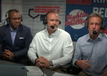 Karl Ravech (r.) with David Ross (c.) and Eduardo Perez (l.) during ESPN's Phillies-Dodgers broadcast on July 20, 2026.