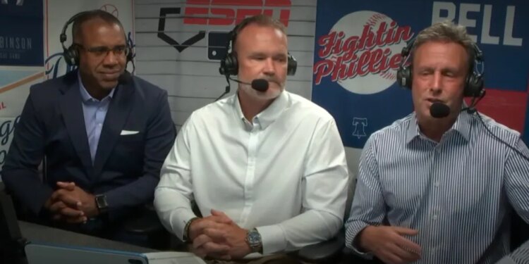 Karl Ravech (r.) with David Ross (c.) and Eduardo Perez (l.) during ESPN's Phillies-Dodgers broadcast on July 20, 2026.