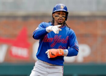 Francisco Lindor of the New York Mets reacts after hitting an RBI single.