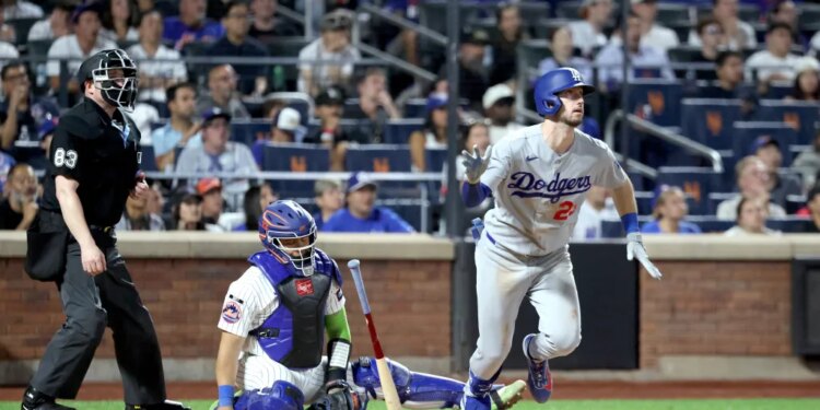 Los Angeles Dodgers right fielder Kyle Tucker #23 tosses his bat after he hits a two-run home run during the eighth inning on July 24, 2026.