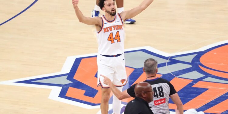 New York Knicks guard Landry Shamet reacting after hitting a 3-point shot in Overtime.