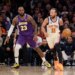 LeBron James defending Jalen Brunson as Brunson dribbles the basketball downcourt during a Lakers vs. Knicks game.