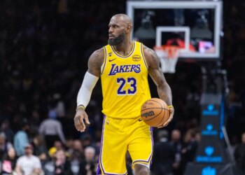 LeBron James of the Los Angeles Lakers dribbling the ball during a game against the Brooklyn Nets.