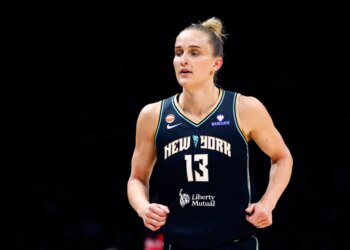WNBA player Leonie Fiebich in a New York Liberty jersey.