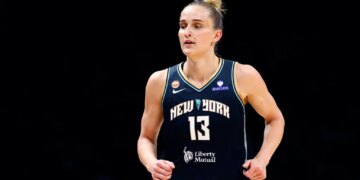 WNBA player Leonie Fiebich in a New York Liberty jersey.