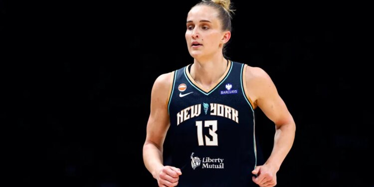 WNBA player Leonie Fiebich in a New York Liberty jersey.