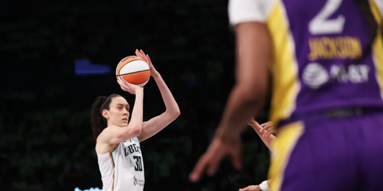 Liberty forward Breanna Stewart (30) shoots a three-point basket during the first half of a game against the Los Angeles Sparks.