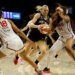 New York Liberty guard Marine Johannes (23) drives to the basket as Washington Mystics forward Kiki Iriafen (44) defends.