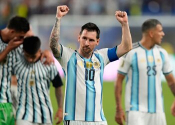 Argentina's Lionel Messi celebrates after a soccer match.
