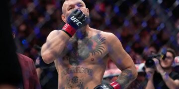 Conor McGregor reacting after losing a welterweight fight.