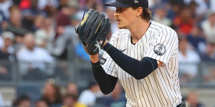New York Yankees pitcher Max Fried (54) pitches in the first inning.