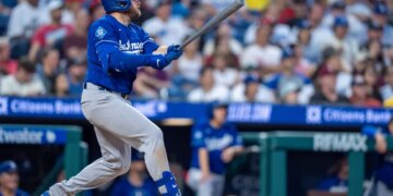 Los Angeles Dodgers' Max Muncy hitting a two-run home run.
