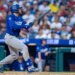Los Angeles Dodgers' Max Muncy hitting a two-run home run.
