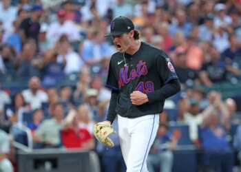 New York Mets pitcher Zach Thornton #49 reacts after getting a double play ending the third inning.