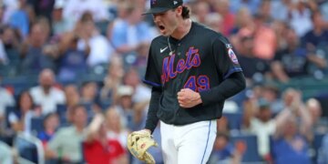 New York Mets pitcher Zach Thornton #49 reacts after getting a double play ending the third inning.