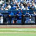 The New York Mets bench reacts during the ninth inning against the Athletics.
