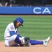 New York Mets shortstop Francisco Lindor (12) sitting on the ground after an error during the ninth inning.