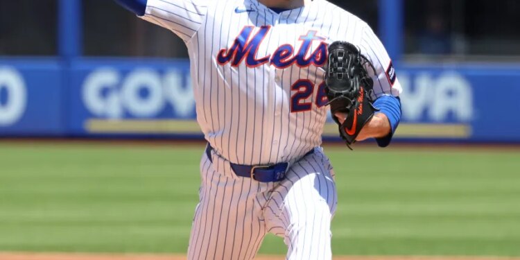 New York Mets pitcher Nolan McLean #26 throws a pitch.