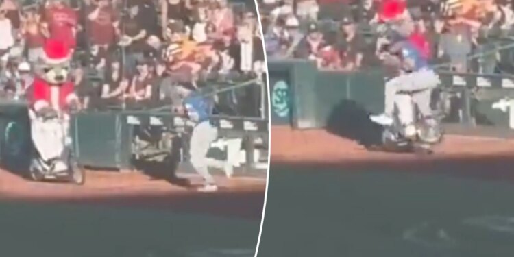 Minor league mascot bowls over Alek Thomas on scooter