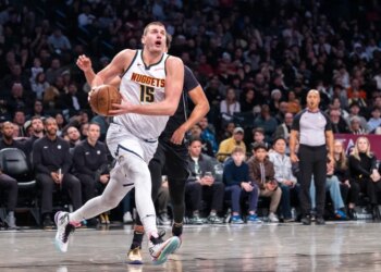 Denver Nuggets center Nikola Jokic (15) drives to the net in the second half against the Brooklyn Nets at Barclays Center on Friday, Dec. 22, 2023, in Brooklyn, NY.