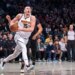 Denver Nuggets center Nikola Jokic (15) drives to the net in the second half against the Brooklyn Nets at Barclays Center on Friday, Dec. 22, 2023, in Brooklyn, NY.