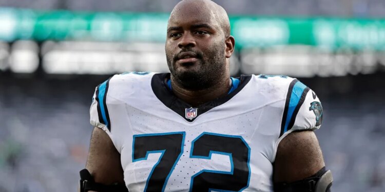 Carolina Panthers offensive tackle Taylor Moton (72) reacts after an NFL football game against the New York Jets on Oct. 19, 2025, in East Rutherford, N.J.