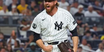 New York Yankees pitcher Paul Blackburn reacting after getting out of the seventh inning with men on base.