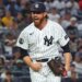 New York Yankees pitcher Paul Blackburn reacting after getting out of the seventh inning with men on base.
