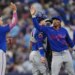 New York Mets' Francisco Alvarez (4) and Francisco Lindor (12) celebrate after defeating the Toronto Blue Jays during a baseball game in Toronto on Tuesday, June 30, 2026. (