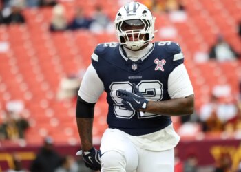 Dallas Cowboys defensive tackle Quinnen Williams (92) on the field.