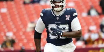 Dallas Cowboys defensive tackle Quinnen Williams (92) on the field.