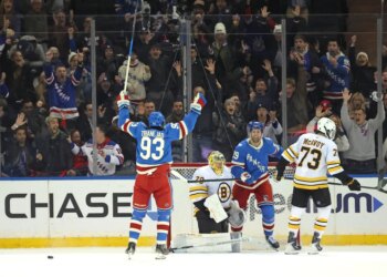 New York Rangers center Mika Zibanejad #93 reacts after New York Rangers defenseman Matthew Robertson #29 scores the game winning goal during the overtime. The New York Rangers defeat Boston Bruins 4-3.
