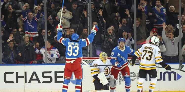New York Rangers center Mika Zibanejad #93 reacts after New York Rangers defenseman Matthew Robertson #29 scores the game winning goal during the overtime. The New York Rangers defeat Boston Bruins 4-3.