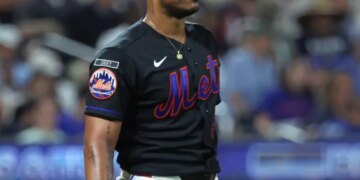 New York Mets pitcher Freddy Peralta #51 reacts after giving up an RBI single.