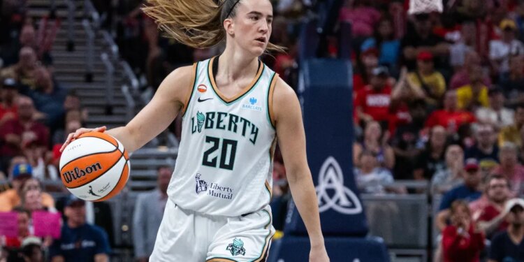 New York Liberty guard Sabrina Ionescu (20) dribbles the ball.