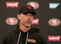 San Francisco 49ers head coach Kyle Shanahan speaks at a news conference.