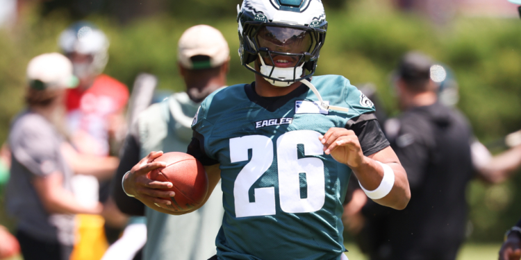 Philadelphia Eagles running back Saquon Barkley (26) runs drills during minicamp.
