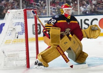 Florida Panthers goalie Sergei Bobrovsky in his uniform, guarding the goal.