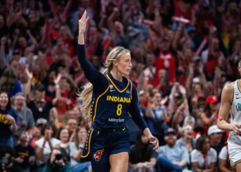 Indiana Fever player Erica Wheeler (8) raises her hand during a game against the New York Liberty.