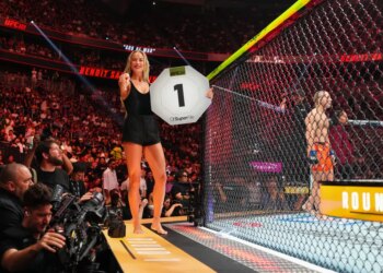 Sophie Cunningham announcing a round in a lightweight fight during UFC 329.