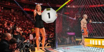 Sophie Cunningham announcing a round in a lightweight fight during UFC 329.