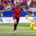Spain's Mikel Merino (6) celebrates scoring their second goal in front of Belgium's Timothy Castagne (21) and goalkeeper Senne Lammens (12) during the World Cup quarterfinal soccer match between Spain and Belgium in Inglewood, Calif., near Los Angeles, Friday, July 10, 2026.