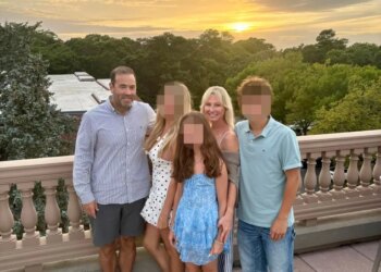 Brian Malloy (far left) pictured with his wife Luiza Malloy (2nd from right) and their children.