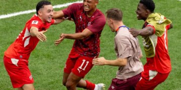 Ruben Vargas (left) celebrates with teammates after scoring the game-winning score on a penalty kick in a 4-3 shootout win over Colombia after a scoreless draw in their World Cup Round of 16 match on July 7, 2026 in Vancouver, British Columbia.